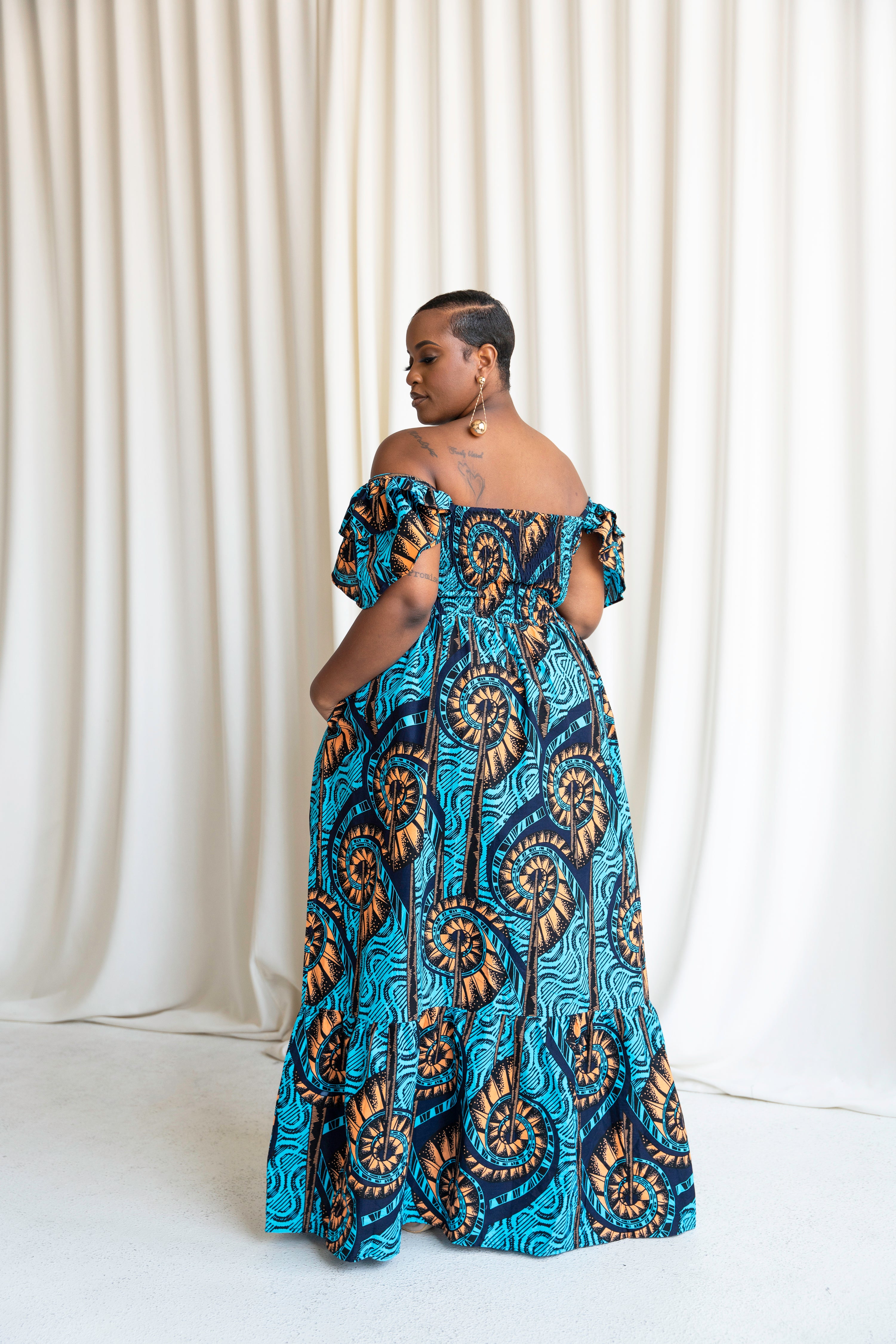 BISI Smocked Ruffle Sleeve African print maxi dress